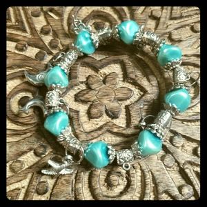 Blue plastic charm bracelet